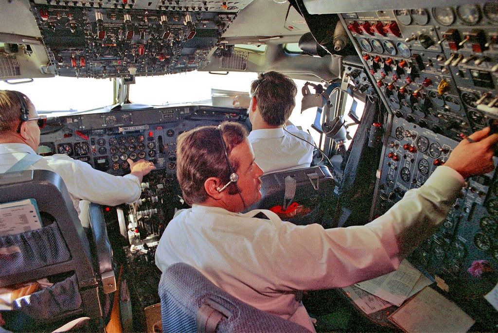 Pan Am Pilot and Cockpit Crew on Board a 707 aircraft Carr | Flickr