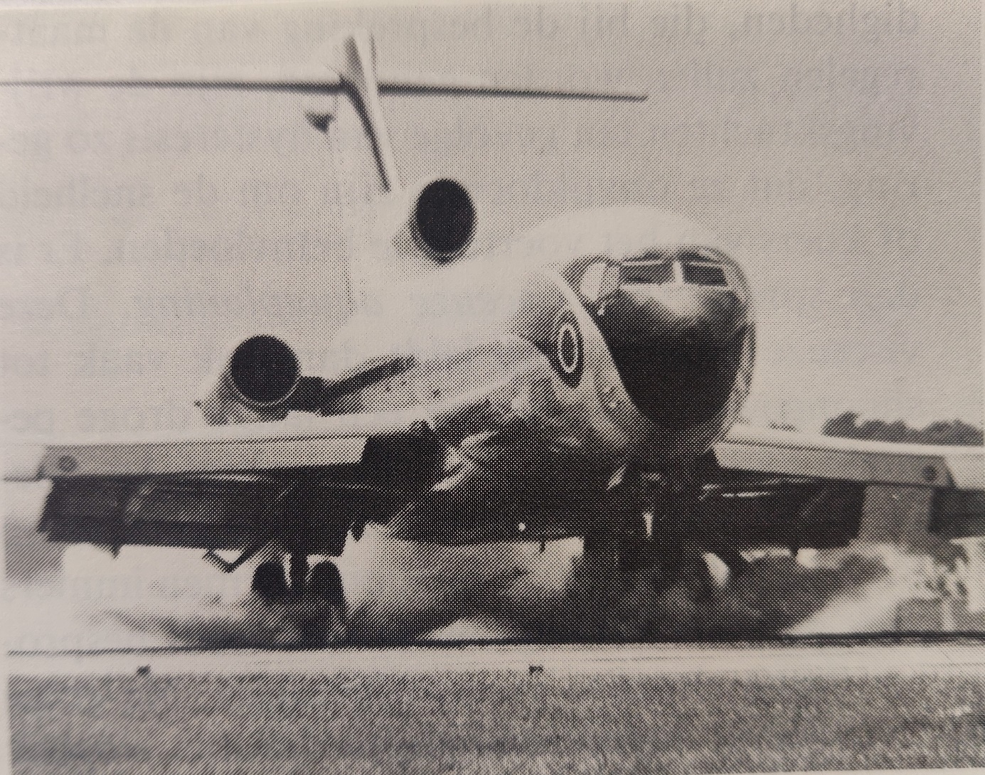 Boeing 727-200 landing on a wet runway for testing