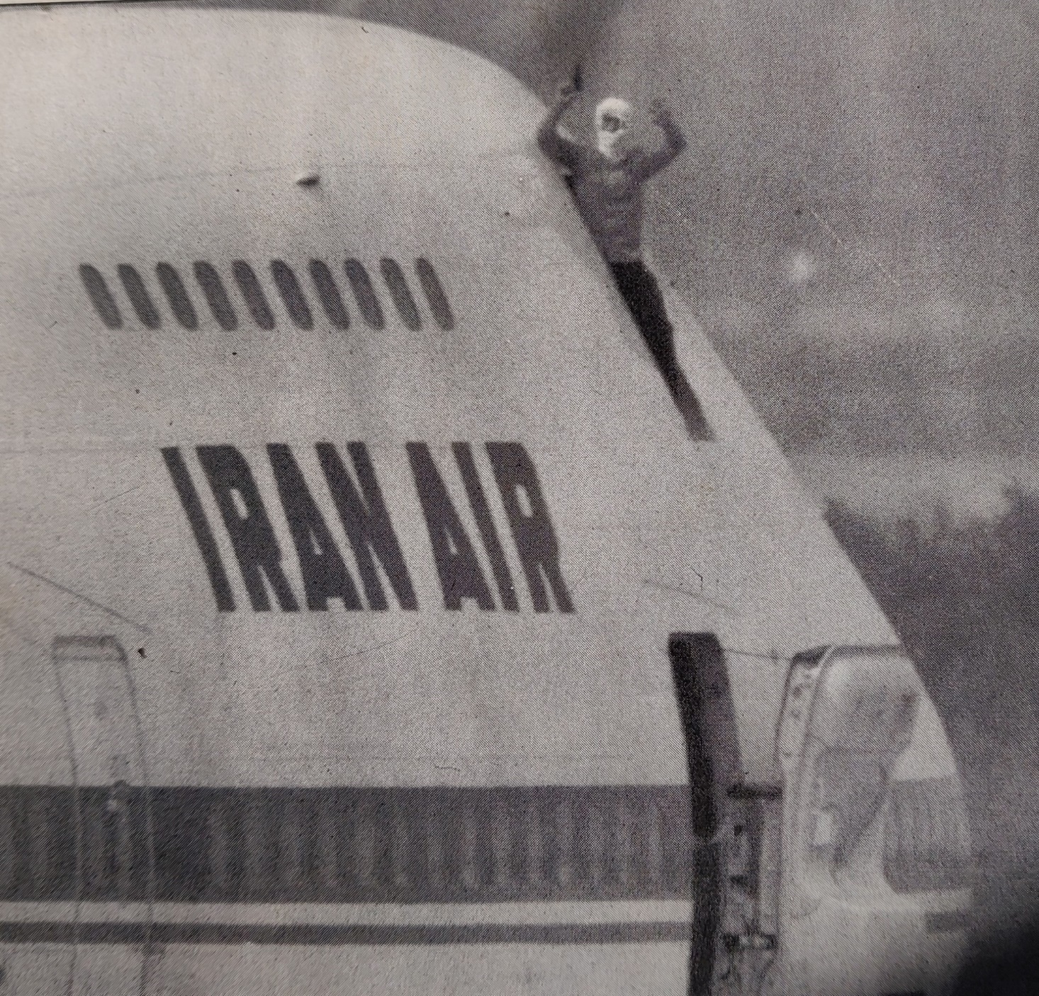 Boeing 747-200B | Iran Air | EP-IAG | hijacker standing in the cockpit door with pistol