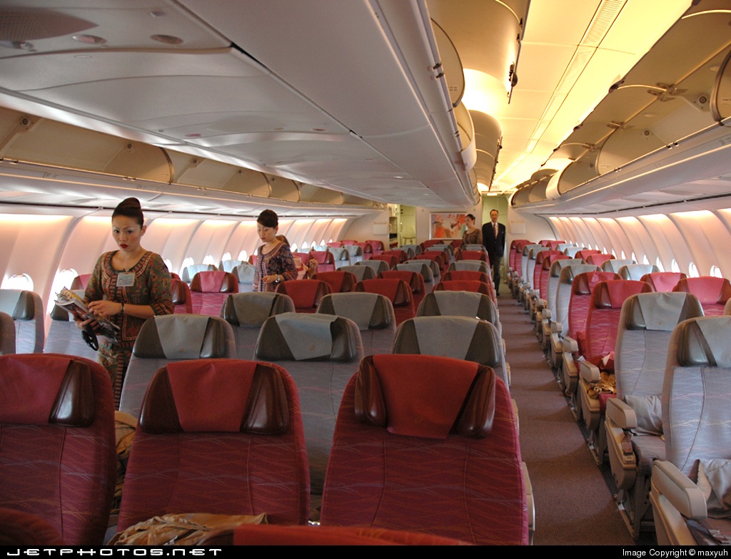 9V-SGD | Airbus A340-541 | Singapore Airlines | cabin interior with stewardesses