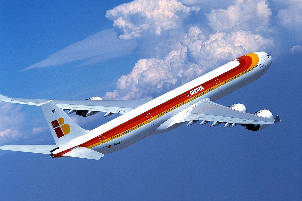 Airbus A340-600 | Iberia | EC-IOB | A340-600 in flight with towering cumulus clouds 