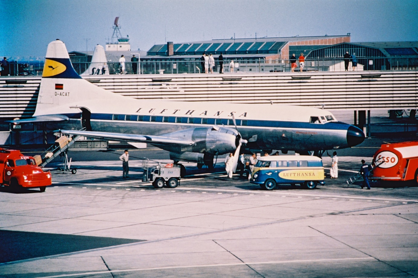 A large airplane is parked at an airport

Description automatically generated with low confidence