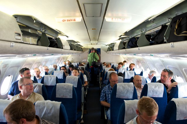 Tupolew Tu-154M cabin picture | By the time I got on board, things were much too crowded to take any cabin shot that could be described as "uncluttered". - Photo: Bernie Leighton | AirlineReporter