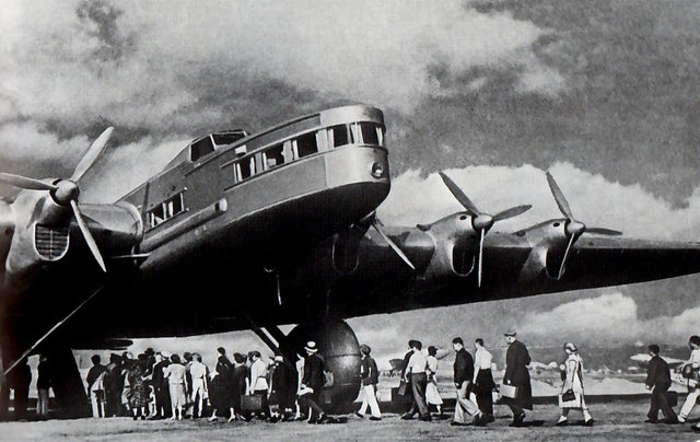 Tupolev ANT-20 Maxim Gorky. The Soviet propaganda plane from 1934 which  sole purpose was to impress. It featured onboard print shop, photo lab and  could project propaganda pictures on clouds. In the