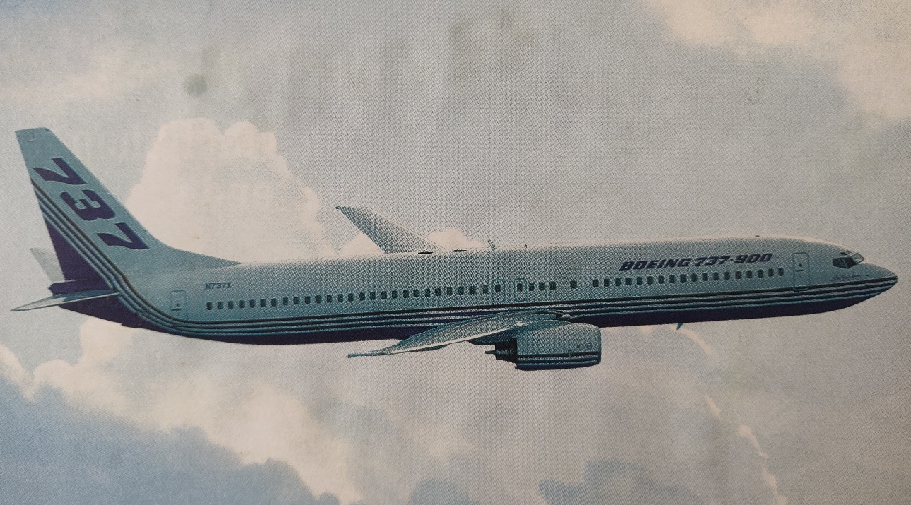 Boeing 737-900 prototype in flight | N737X