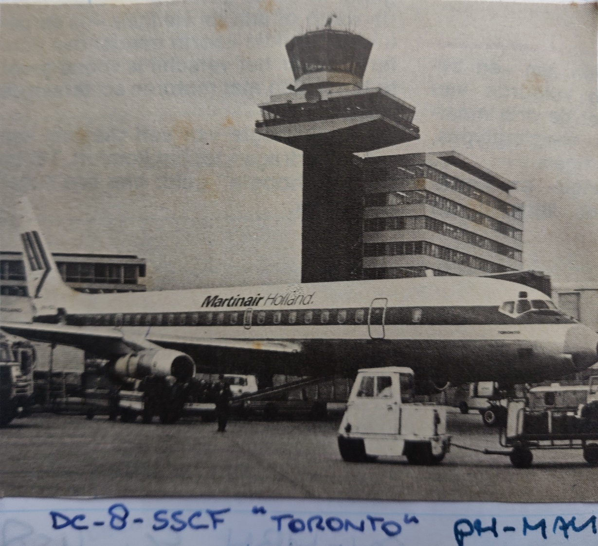 DC-8-55CF PH-MAU "Toronto" in front of ATC tower Schiphol airport