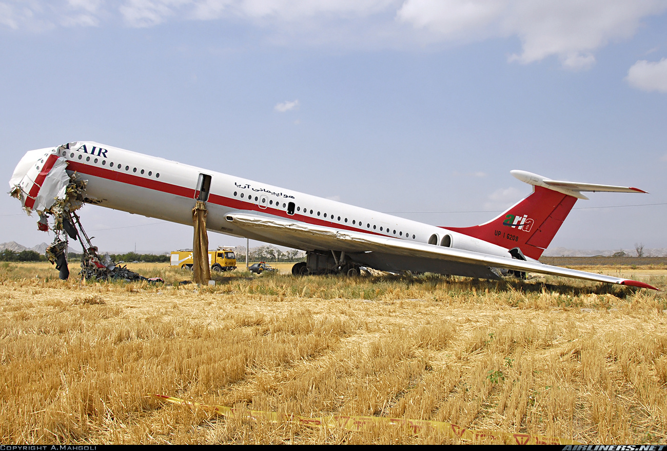 Ilyushin Il-62M | Aria Air | UP-16208 | picture of the aircraft at the crash site | aircraft nose smashed | safety slides deployed