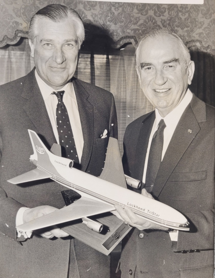 Sir Kenneth Keith and Daniel Jeremiah Haughton posing  with a Lockheed L1011 model in a London Hotel