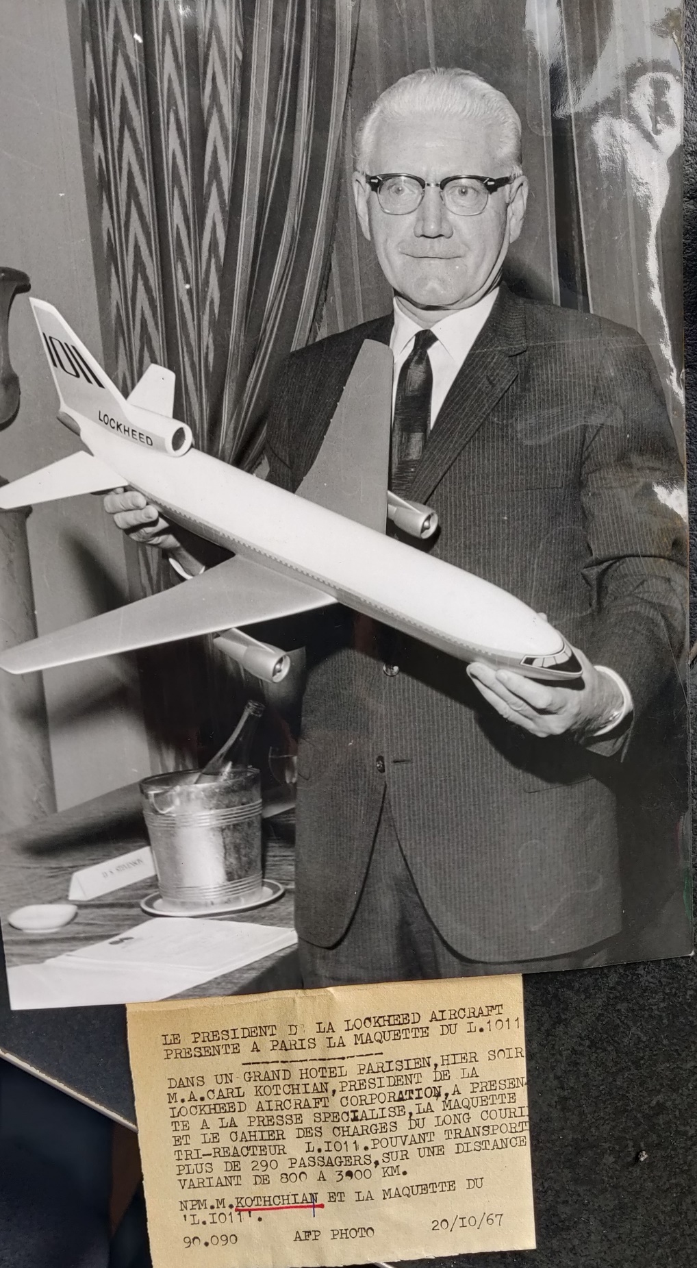 Lockheed president M.A.Carl Kotchian posing with a model of the Lockheed L1011 in a hotel in PAris