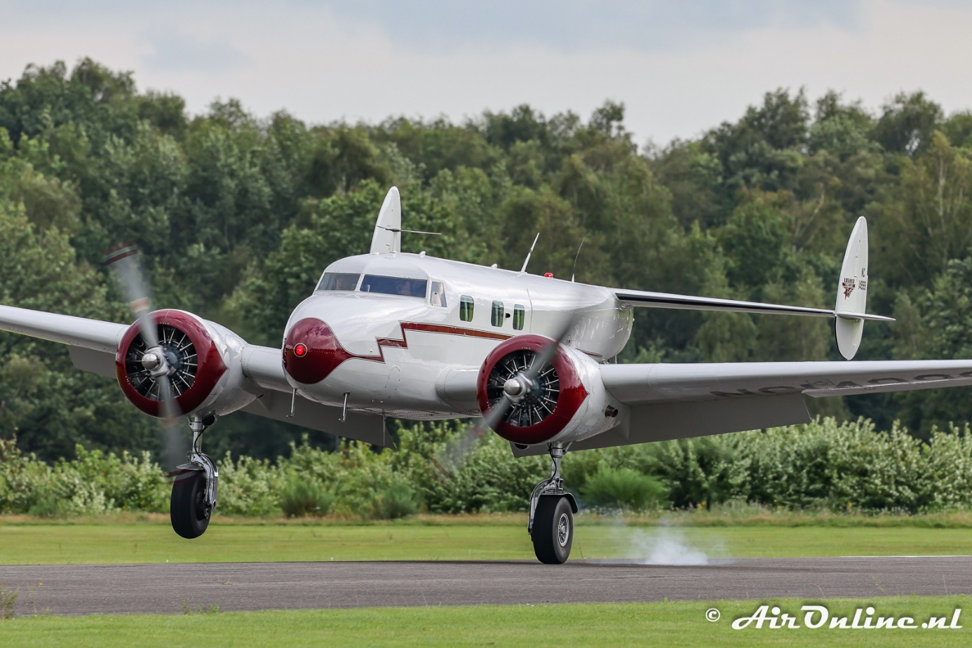 N14999 Lockheed 12A Electra Junior tijdens Fly-In op Genk Zwartberg |  AirOnline.nl