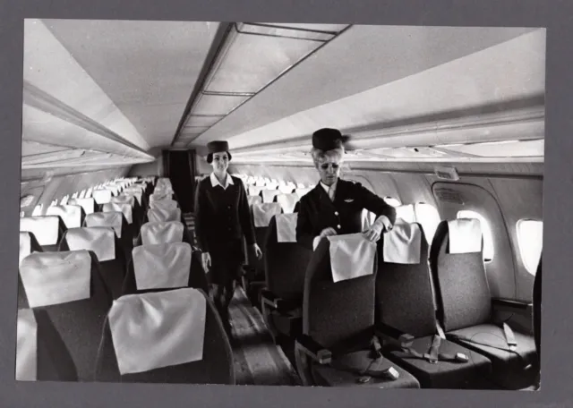 Tupolew Tu-154 interior with two stewardesses