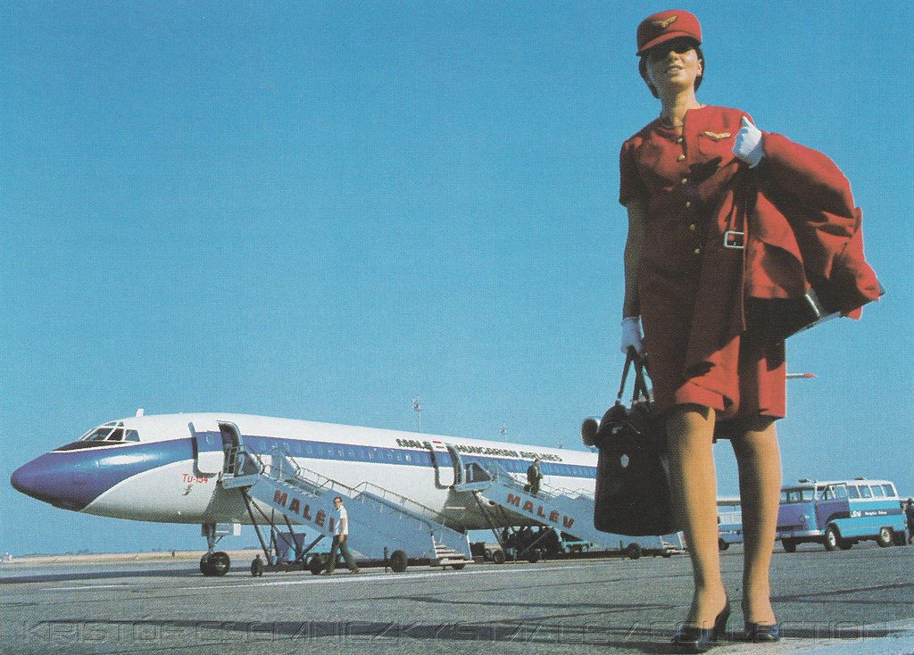 MALEV Hungarian Airlines stewardess with TU-154 in the bac | Flickr