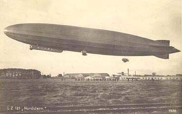 Zeppelin LZ121 Nordstern flying over a field