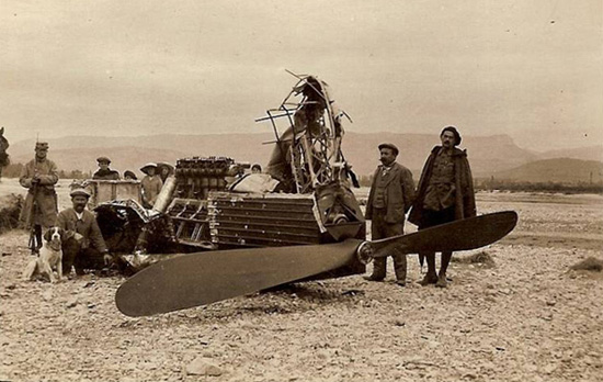 People posing around the engine from  Zeppelin L45 on the drybed of the river Buech, southern France